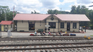 Patrons ride the model train around the Mars Train Station. 